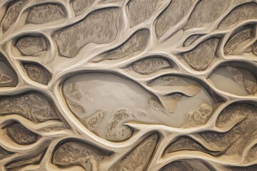 Abstract aerial view of sculpted sand patterns