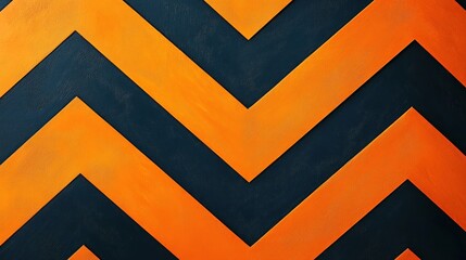 A close up of a wall with orange chevron stripes against a dark blue background creating a zig zag pattern
