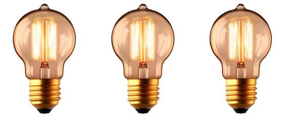 Three Illuminated Edison Style Bulbs Isolated Against A Transparent Background With Gold Base And Warm Glow Displaying Inner Filaments