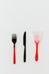 Colorful Cutlery Arrangement on a Light Background for Minimalist Kitchen