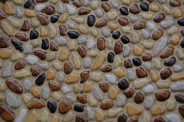 Natural Pebble Surface: Earthy Tones and Textures