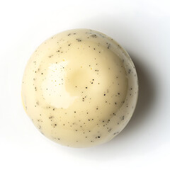 Close-up of a creamy, speckled bath bomb on a white background