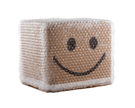 Cardboard box with smiley face and bubble wrap