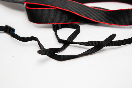 camera support strap with a white background in Rio de Janeiro.