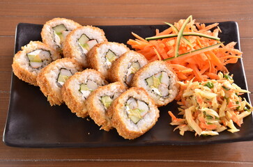 Delicious Japanese cuisine platter with sushi rolls, fried tofu and rice bowl for healthy eating