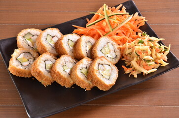 Delicious Japanese cuisine platter with sushi rolls, fried tofu and rice bowl for healthy eating
