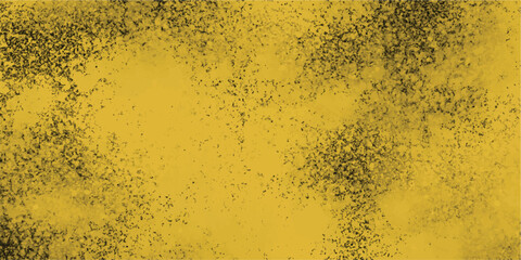 Abstract yellow background with scattered dark speckled texture for graphic design and artistic presentations