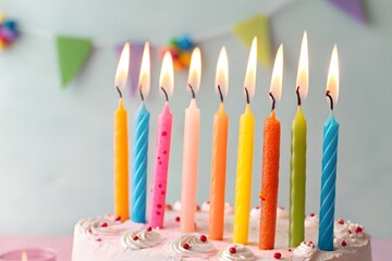 Lighted birthday candle wax photographed up close against a blue background. design illustration