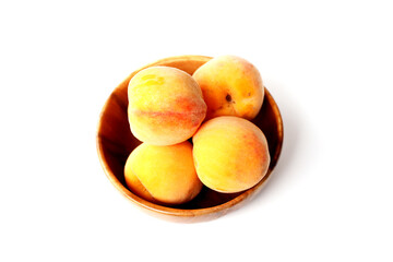 Fresh ripe apricots on a white background.