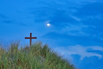 Wooden Cross On Beach Morning Storm Cloud Sky