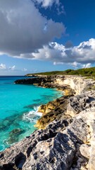 Obraz premium Turquoise water, rocky coast, dramatic clouds