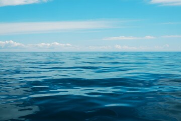 Obraz premium Majestic Ocean View Azure Waters and Tranquil Horizon Blue Sky with Wispy Clouds Calm and Serene