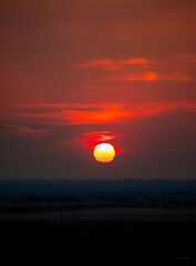 Deep red sunset in Wyoming, dramatic red palette portrait format