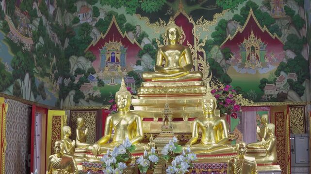 Gilded Buddha statues in Wat Don Mueang Phra Aram Luang