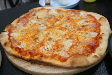 ham and cheese pizza or cheese pizza or Hawaiian pizza or Italian pizza