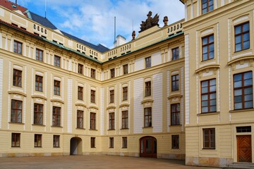 Discover the beauty of Prague with this view of the Prague Castle courtyard. Experience the rich...