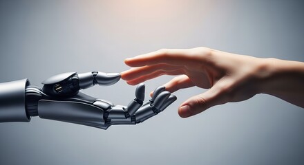 Human hand reaching towards a metallic robotic hand against a light background.