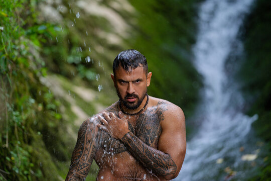 Healthy life strong man outdoors. Fit muscular male summer portrait. Healthy lifestyle man in nature. Athletic guy water splash. Healthy man. Fitness lifestyle. Healthy body. Man in nature.