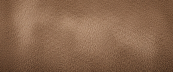 Brown textured background with subtle patterns creates a warm and organic feel, combining earthy tones and natural detail for comforting design themes or soft visual compositions.