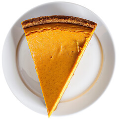 A slice of pumpkin pie served on a white plate, viewed from above.