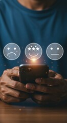 Close-up of person holding smartphone with feedback emoticons. Digital rating system with happy, sad, and neutral faces.