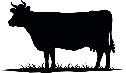A stark black silhouette of a cow standing on a patch of grass against a plain white background view