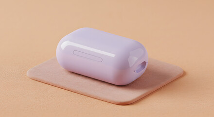 Fototapeta premium A modern pastel lavender earbuds case on a peach-colored mat