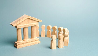 Wooden figures standing before classical building symbolizing law and government