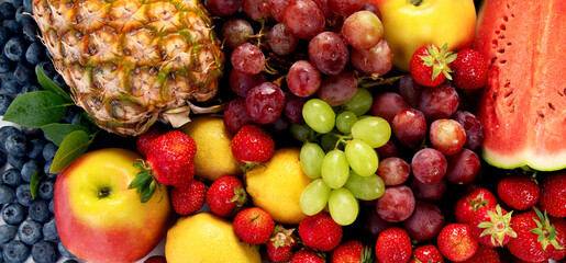 Variety of fruits and berries. Fresh raw  fruits.