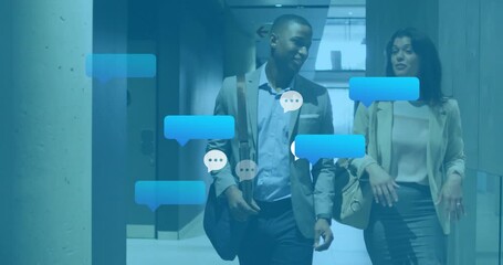business duo walking corridor causing chat bubbles forming around discussion fading near glass wall - Powered by Adobe