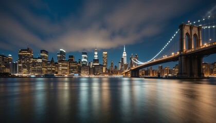 Fototapeta premium nighttime panoramic view of urban skyline with illuminated bridge reflecting on water surface