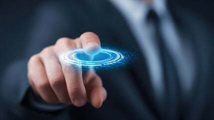 Man touches a glowing, circular interface in a dark business suit