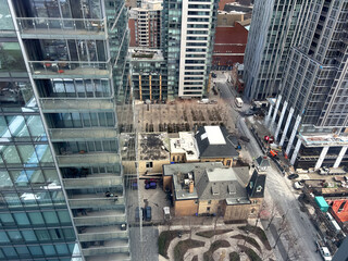 Urban landscape showing a blend of modern architecture and historic structures during daytime from...