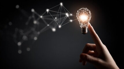 Digitally rendered lightbulb, formed from network connections, touched by a pointing finger
