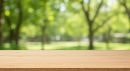 Empty wooden table top with blurred green garden park background – perfect for product display, montage, or mockup presentation