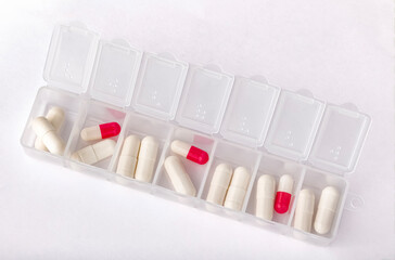 transparent medicine container for a week,with medicine capsules