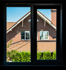 View from the window of a neighboring private house.