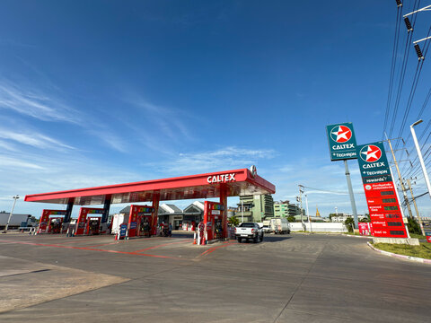 Bangkok, Thailand - June 23, 2025: Caltex fuel station with Techron branding and signage under clear blue sky