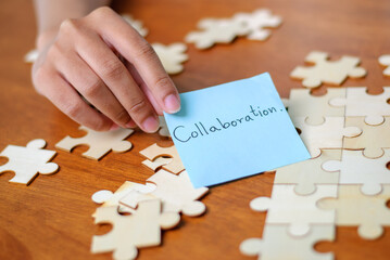 Collaboration action business environment puzzle pieces table creative viewpoint for teamwork concepts