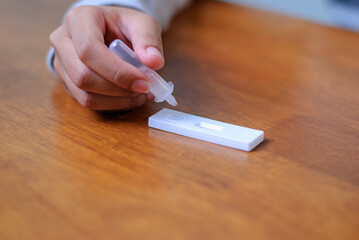 Self-testing medical procedure home environment health awareness indoor setting close-up view personal care
