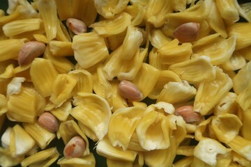 jackfruit seed and edible bulbs of the jackfruit which are the sweet, orange-yellow parts 