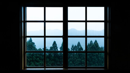 Window with a view of the mountains