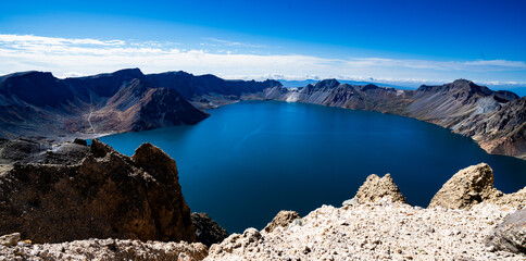 CHANGBAI MOUNTAIN, CHINA - SEPTEMBER 13, 2024: A collection of images showing the stunning view of Cheonji (Heaven Lake), the crater lake of Baekdusan (Mount Paektu), on the border of China and North 