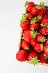 Wicker Basket Overflowing with Strawberries