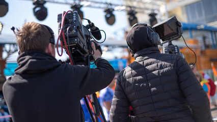 TV camera on the street shooting.