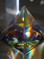 Glass pyramid with a rainbow inside