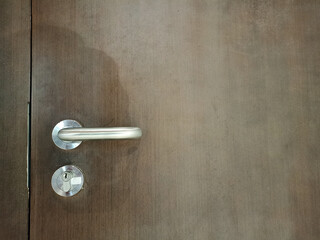 wooden door handle and keyhole