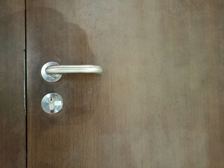 wooden door handle and keyhole