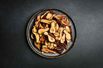 Homemade slices of dried pears.Dried pear or pear chips.Dried fruits