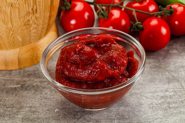 Red tomato paste in the bowl